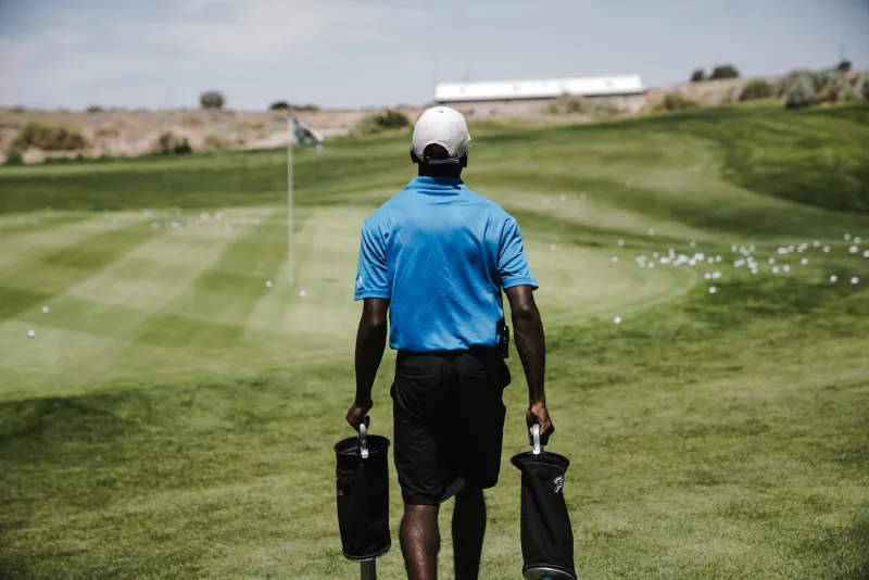 From Caddie to Concierge: How Golf's Lone Wolves Became Traveling Royalty
