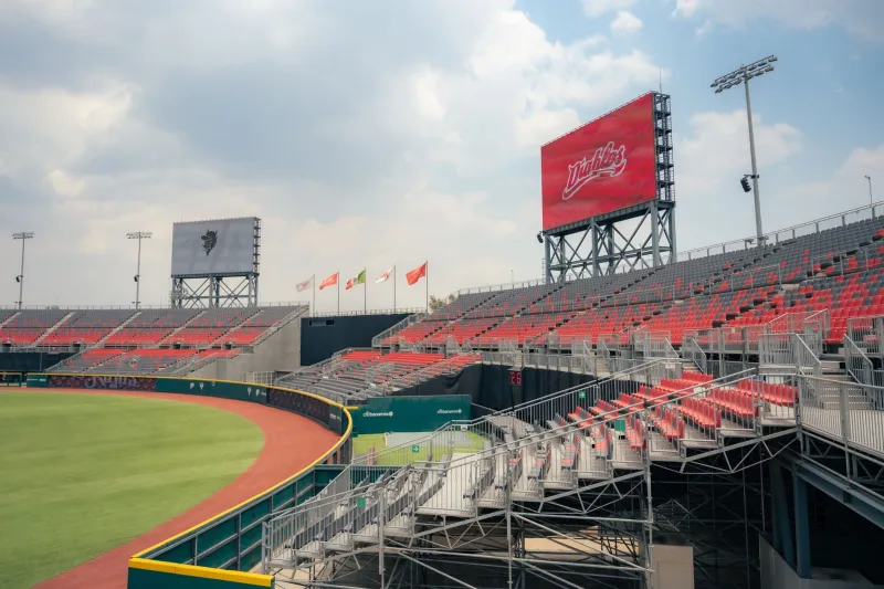The Kid With the Number Boards: How Baseball Scoreboards Went From Muscle to Megapixel